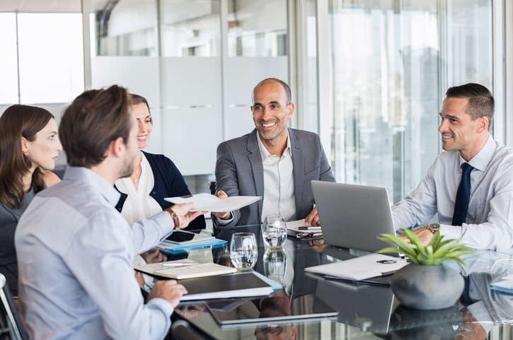 Businesspeople Working In Meeting